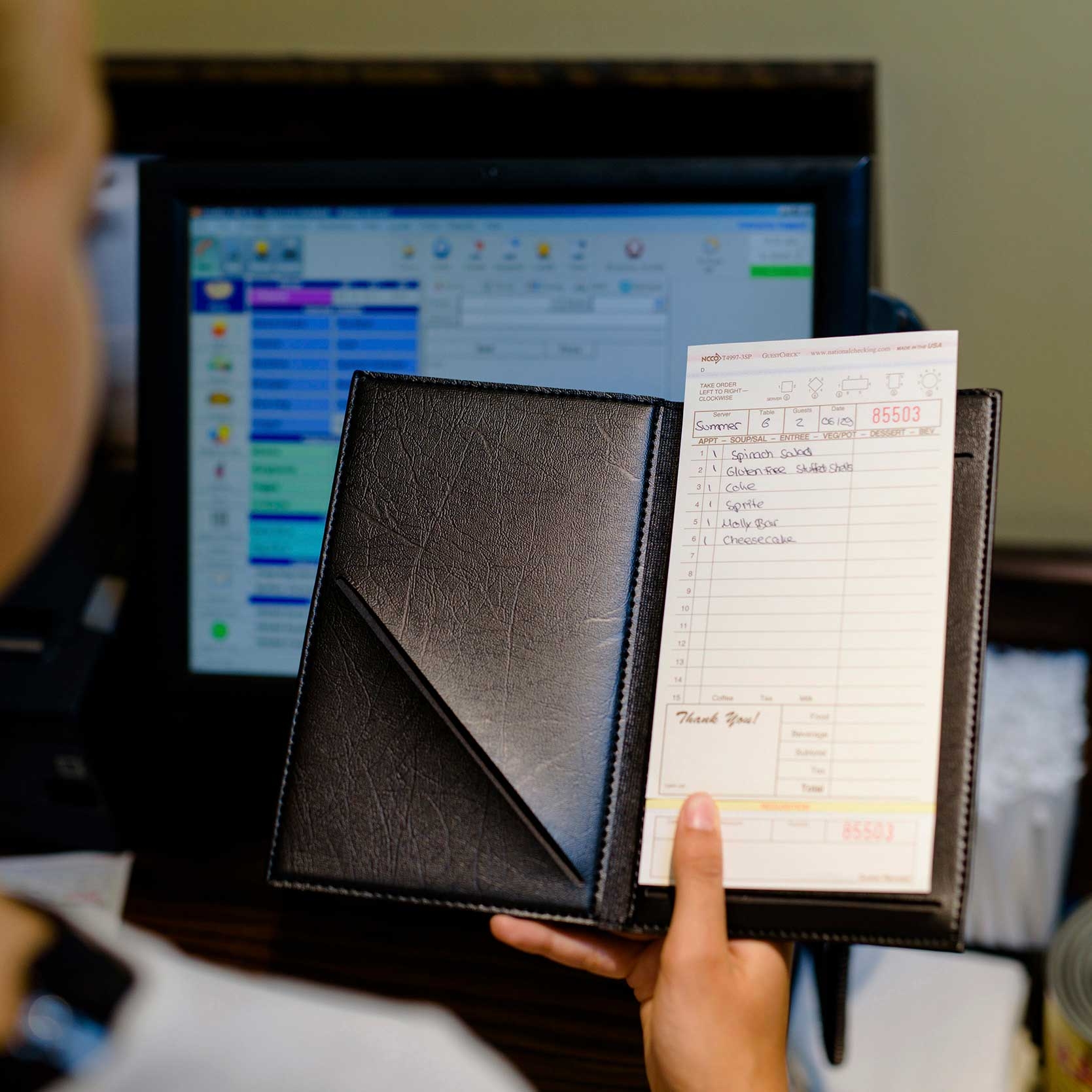 National Checking Company Carbonless Guest Check Board - 3 Part Tan, 15 Line, 4.20 x 8.5 inch -- 2000 per case.